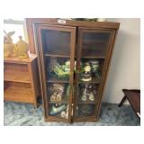 Wooden shelf with glass doors without contents