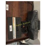 Atari game system and an a.m. FM radio