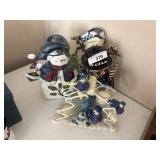 Snowman candle and decorations