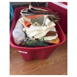 Tub full of table covers and heat pads