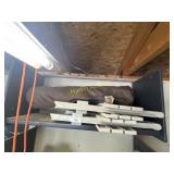 2 plastic tables and a bag chair