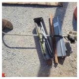 pair of metal sawhorses and Techo weed eater