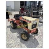 Simplicity riding lawn mower with tiller attach