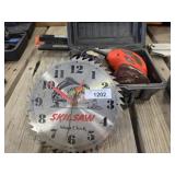 Skil saw wall clock with Black & Decker sander