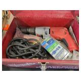 Milwaukee toolbox with drill and screws
