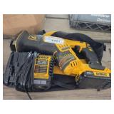 DeWalt battery powered saw with charger bag and