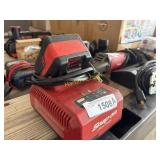 Snap on battery with charger