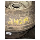Used 9.5-14 tire on 8 bolt rim