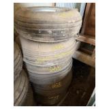 Used 9.5-14 tire on 8 bolt rim
