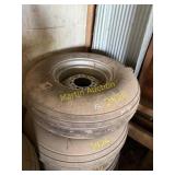 Used 9.5-14 tire on 8 bolt rim