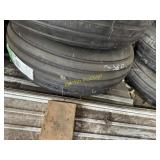 Unused 12.5-16' 12 ply tire mounted on 8 hole rim.