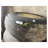 Used 12.5-16' 12 ply tire mounted on 8 hole rim.
