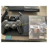 PlayStation2 with game and control RWE