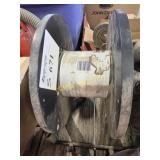 Electric fence wire roller