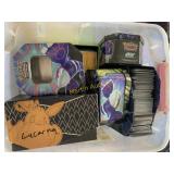 tote of Pokï¿½mon cards and Pokï¿½mon tins  RWE