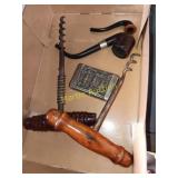 Pipes, cork screws and tie pens