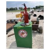 Old oil/fuel tank with hand pump