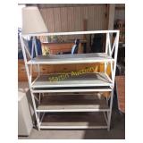 2 matching shelving units