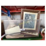 Totes full of antique pictures