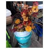 Buckets and fake flowers