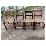 Four wooden outdoor chairs