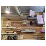 Pottery items hanging on wall and baskets