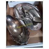 Metal dishes, gravy bowl, utensils, platters
