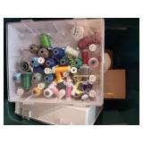 Sewing machine and thread