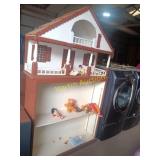 Child's bookcase and dollhouse