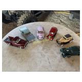 Five assembled model cars
