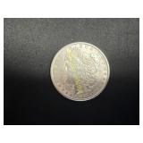 1889 Morgan silver dollar  TJ