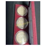 Three 1921 Morgan silver dollars