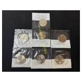 1963 Franklin half dollar and six Kennedy half