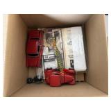 Box of assembled models and brochures