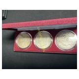 Three 1921 Morgan silver dollars