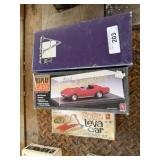 2 Models  Open Boxes And A Display Case