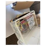 Two boxes of model parts