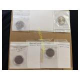 Two 2002 and two 2005 Kennedy half dollars  TE