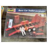 Race car trailer with equipment unopened box