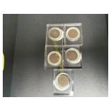 Five Indianhead pennies   TM