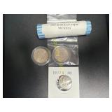Two uncirculated quarters, roll of Westward   TM
