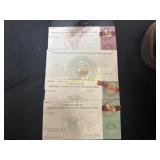 Four officially graded an uncirculated dollar   TC