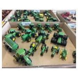 Multiple John Deere tractor collectibles 1/64
