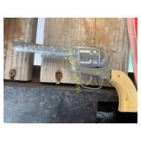 John Deere toy tractor and toy gun