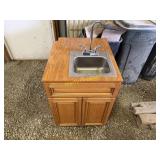 Sink with portable water pump and drain tank