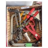Box of assorted hand tools including pliers, cutte