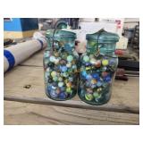 2 Mason jars full of vintage marbles