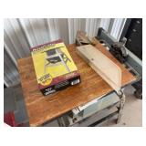 Heavy-duty metal table saw with stand and DustCutt