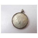1964 Silver Kennedy Half Dollar in Bezel