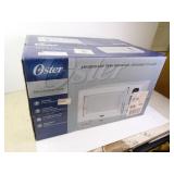New Oster 1.1cu ft Microwave